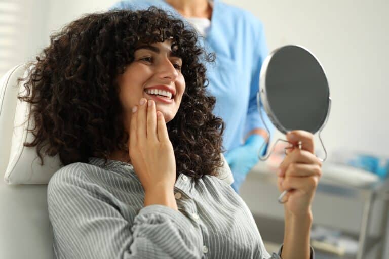 woman smiling after wisdom teeth removal in cloverdale